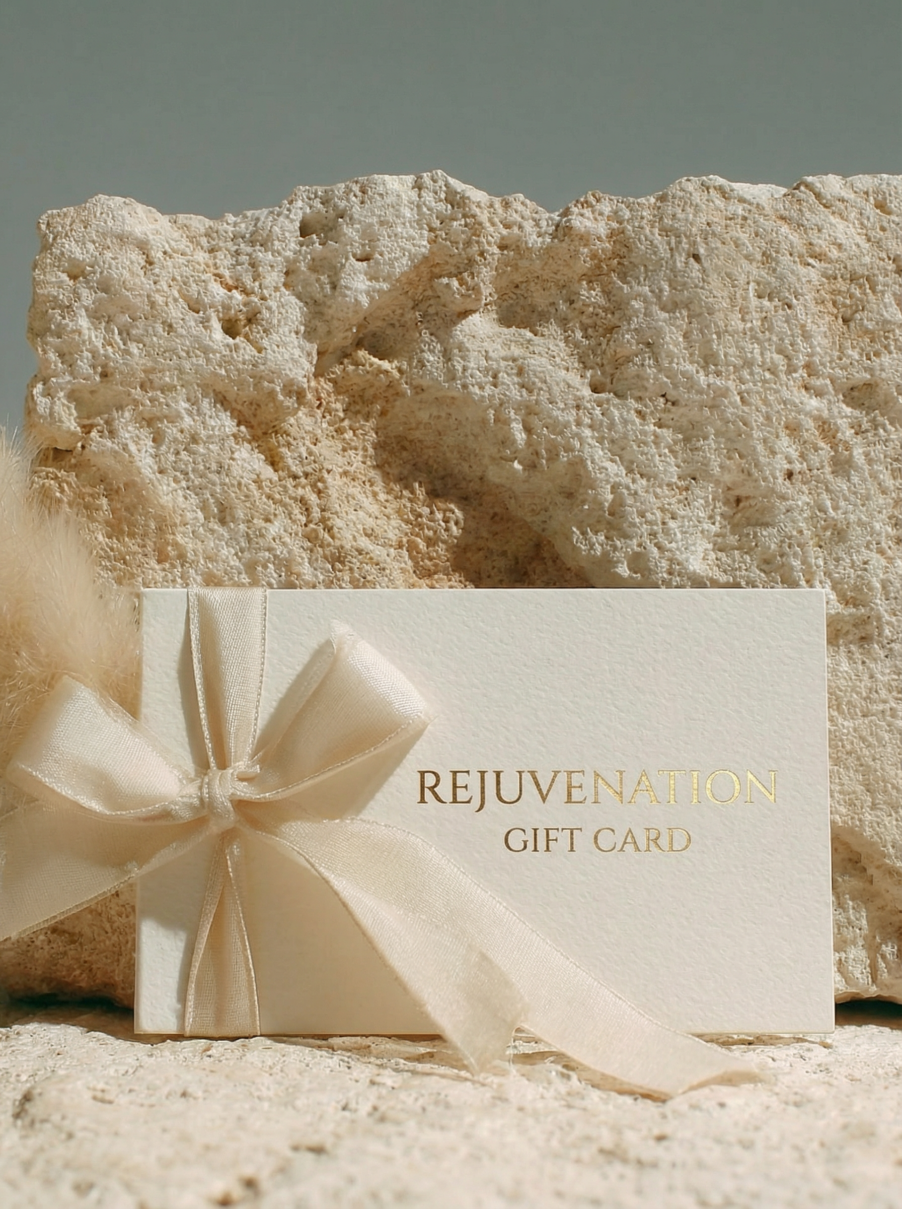Rejuvenation gift card with cream ribbon